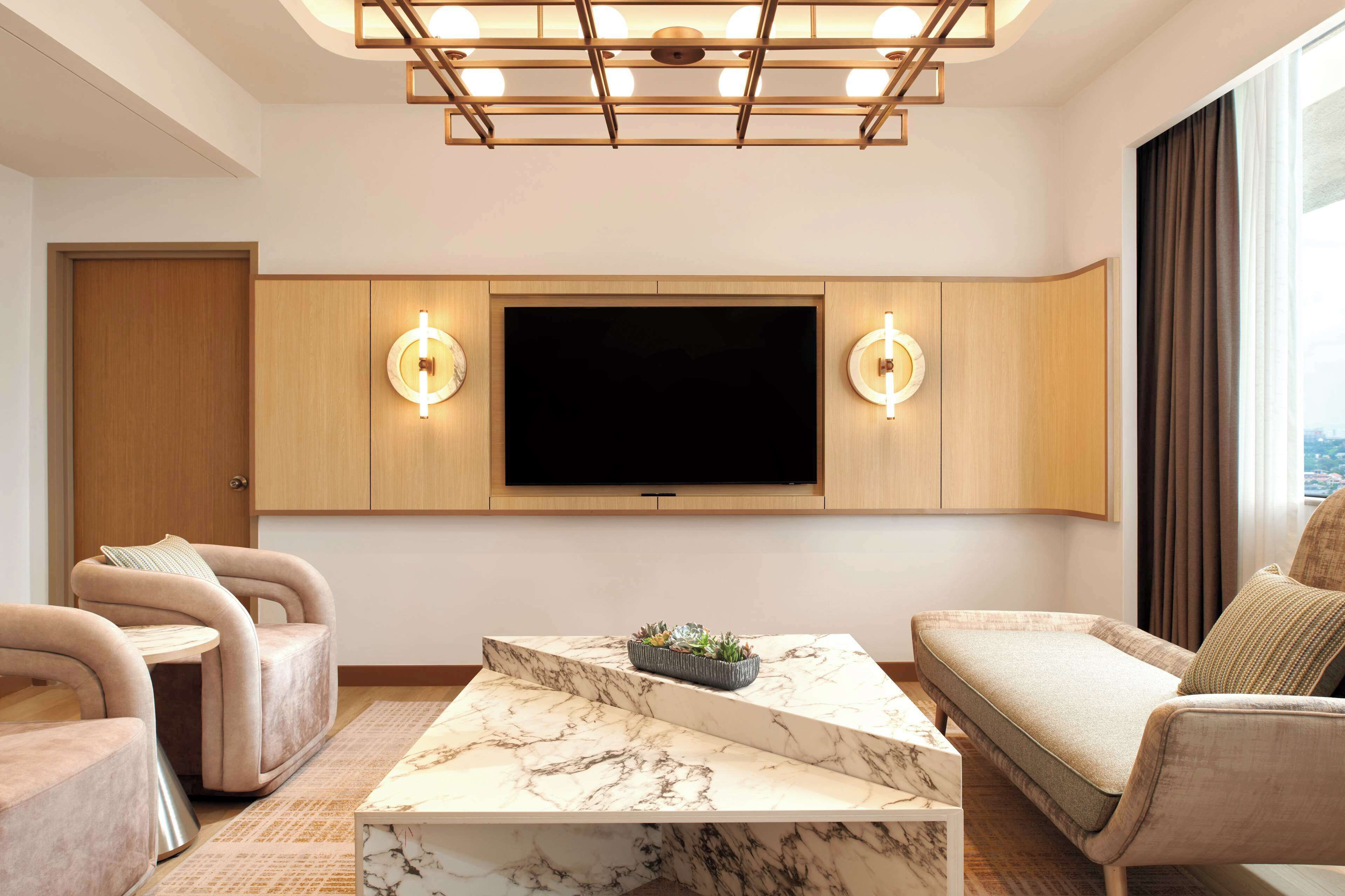 king royal suite with lounge access | living area | 42-inch lcd tv with satellite channels, tv, mp3 dock