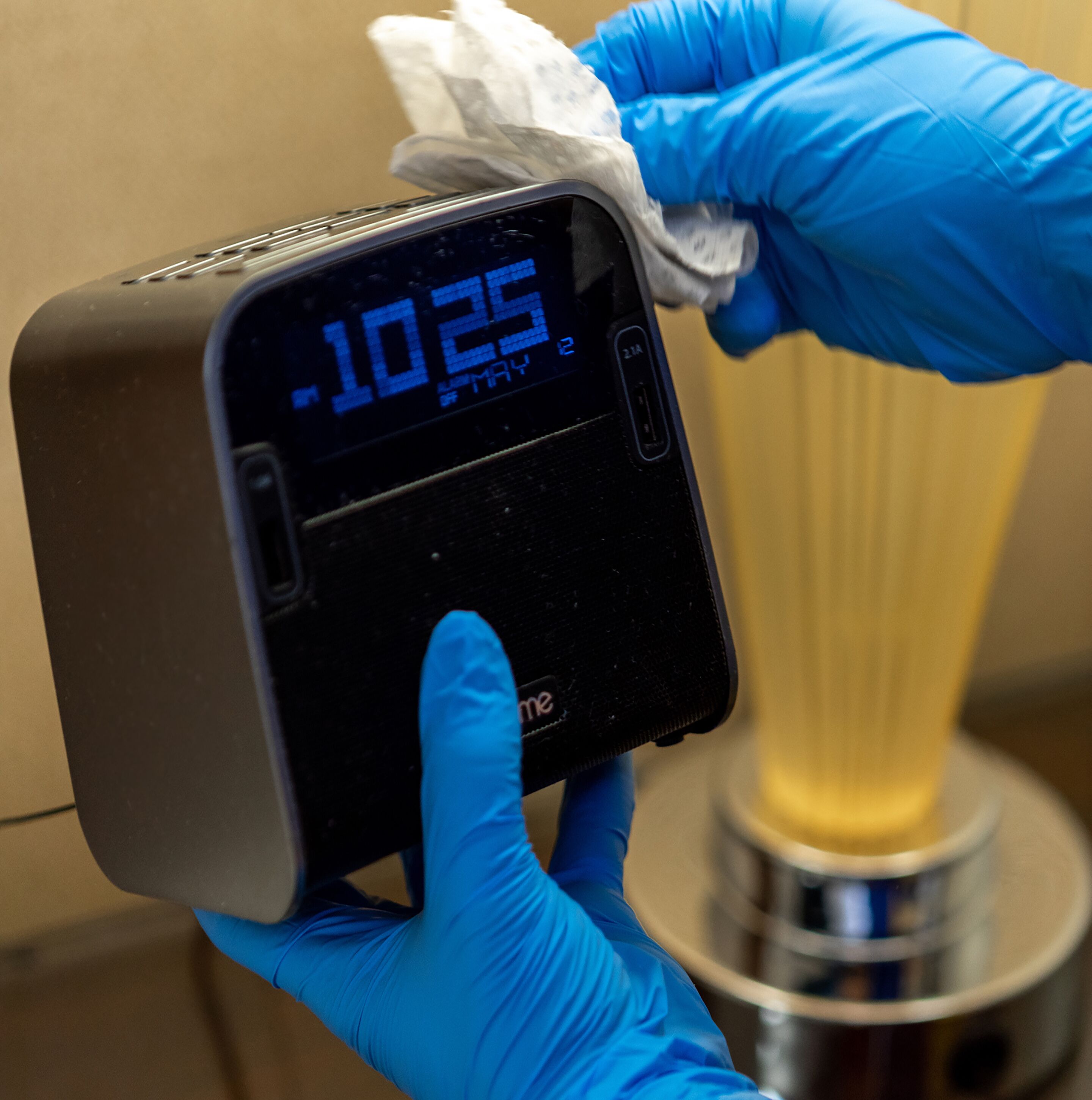 A digital device displaying a time of 10:25.