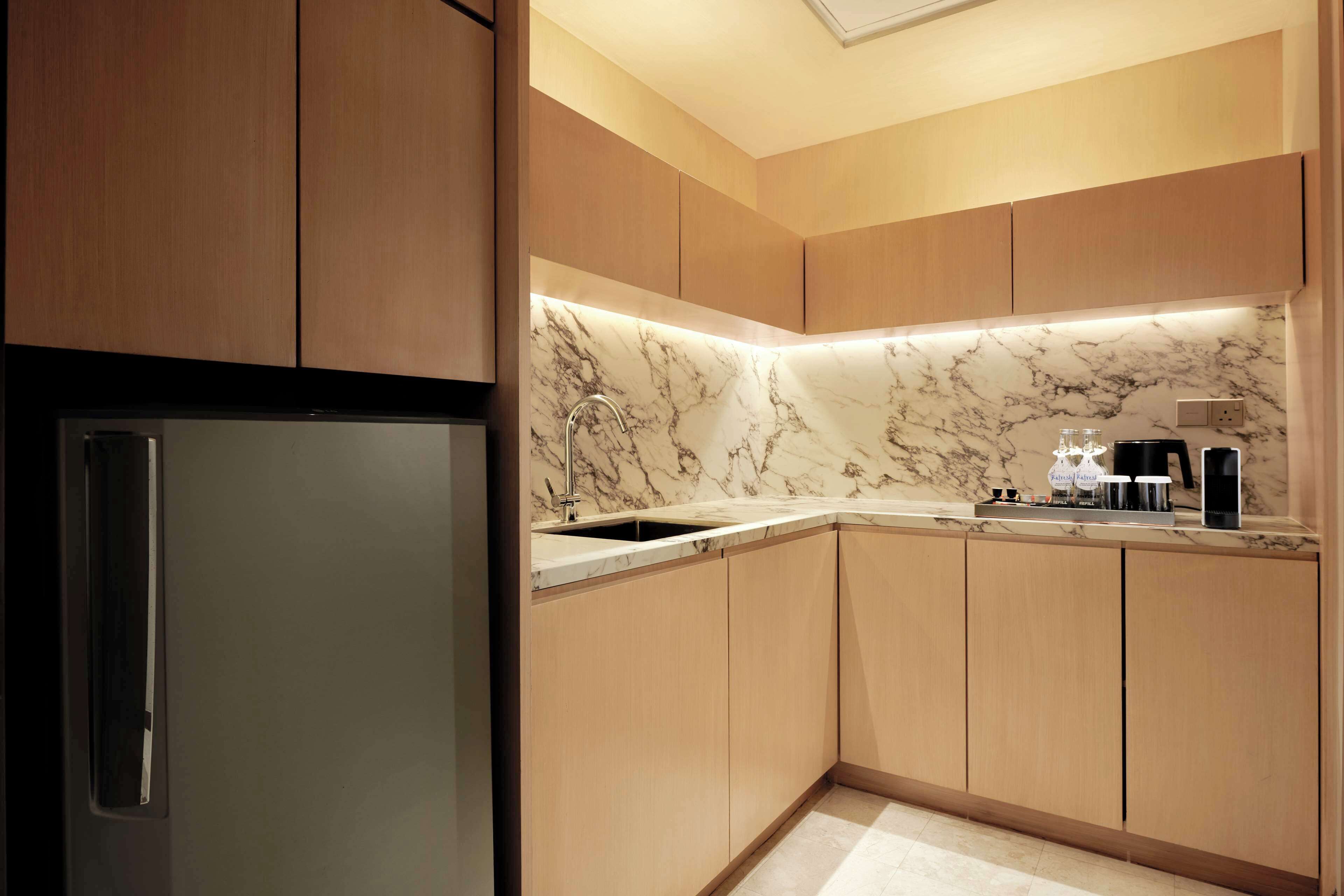 king royal suite with lounge access | private kitchen | coffee/tea maker