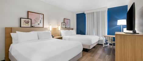 Rideaux occultants, chambres insonorisées, fer et planche à repasser