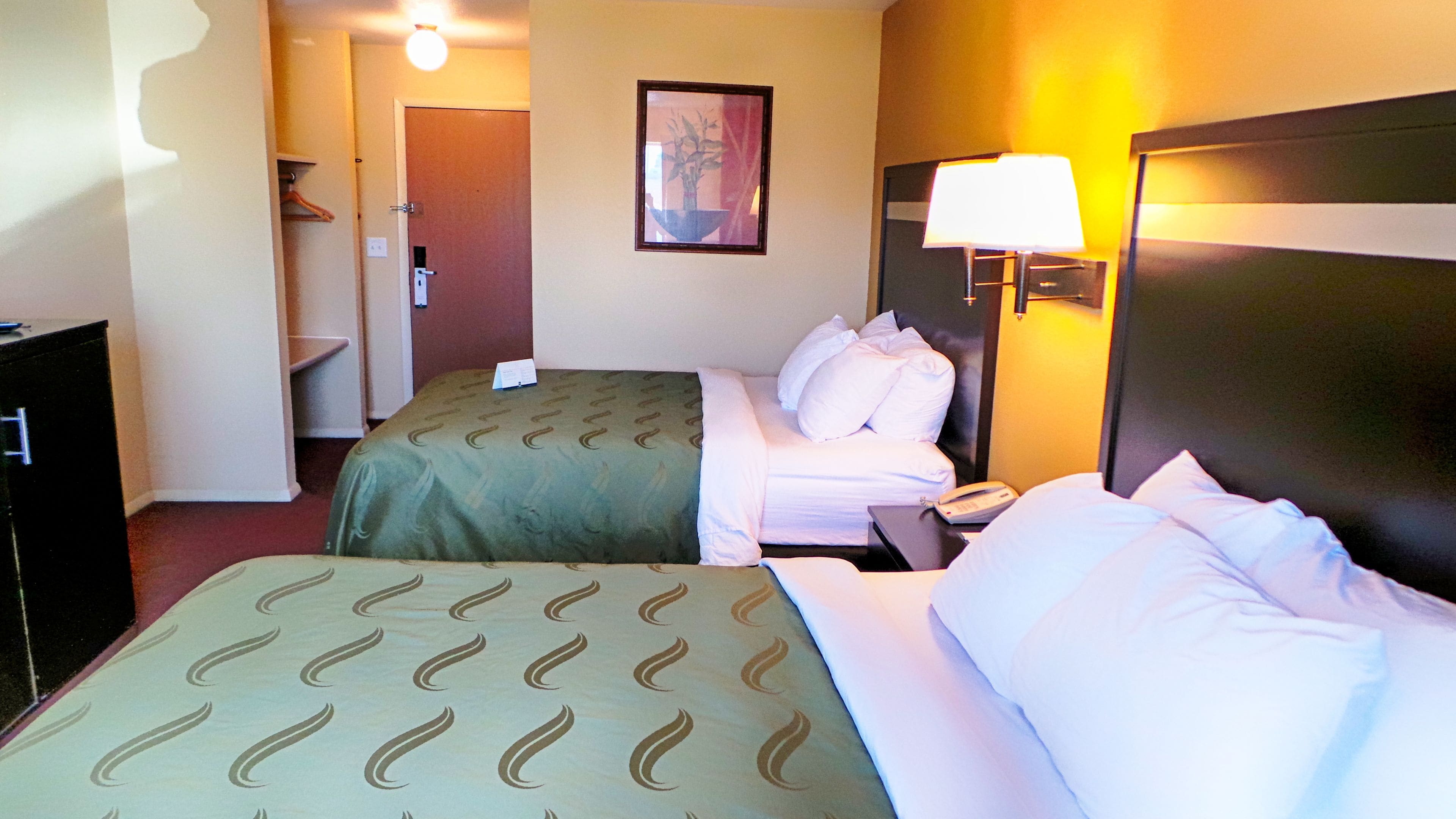 standard room, 2 queen beds, non smoking | 1 bedroom, desk, laptop workspace, iron/ironing board