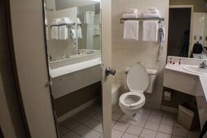 Combined shower/tub, hair dryer, towels, soap