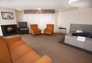 Junior Single Room, 1 Bedroom, Jetted Tub | Living room | 32-inch flat-screen TV with satellite channels, TV