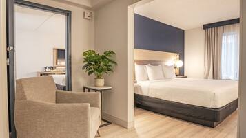 Deluxe Suite, 1 King Bed, Non Smoking | Premium bedding, in-room safe, desk, laptop workspace