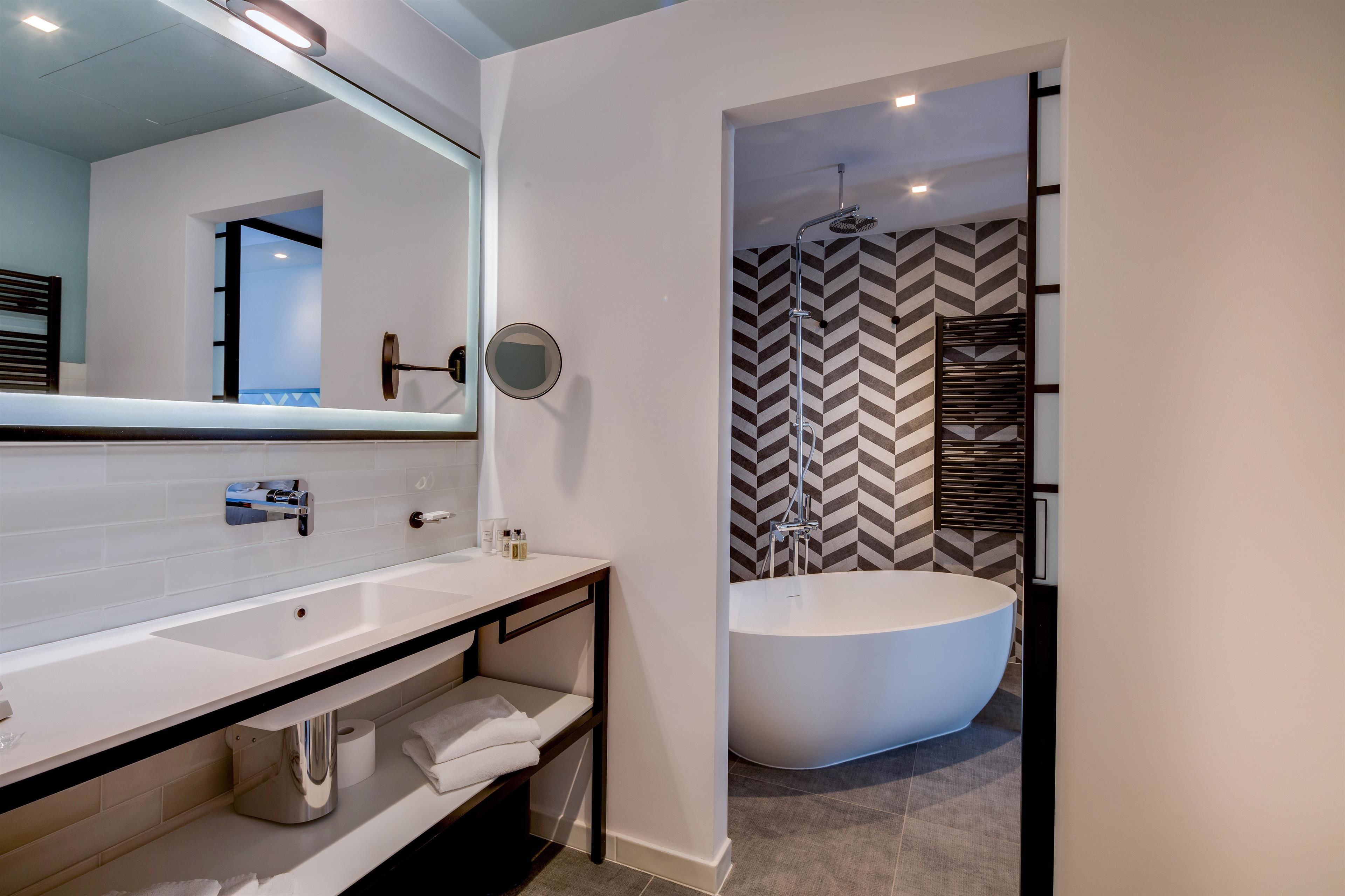 eco-friendly toiletries, hair dryer, bidet, towels