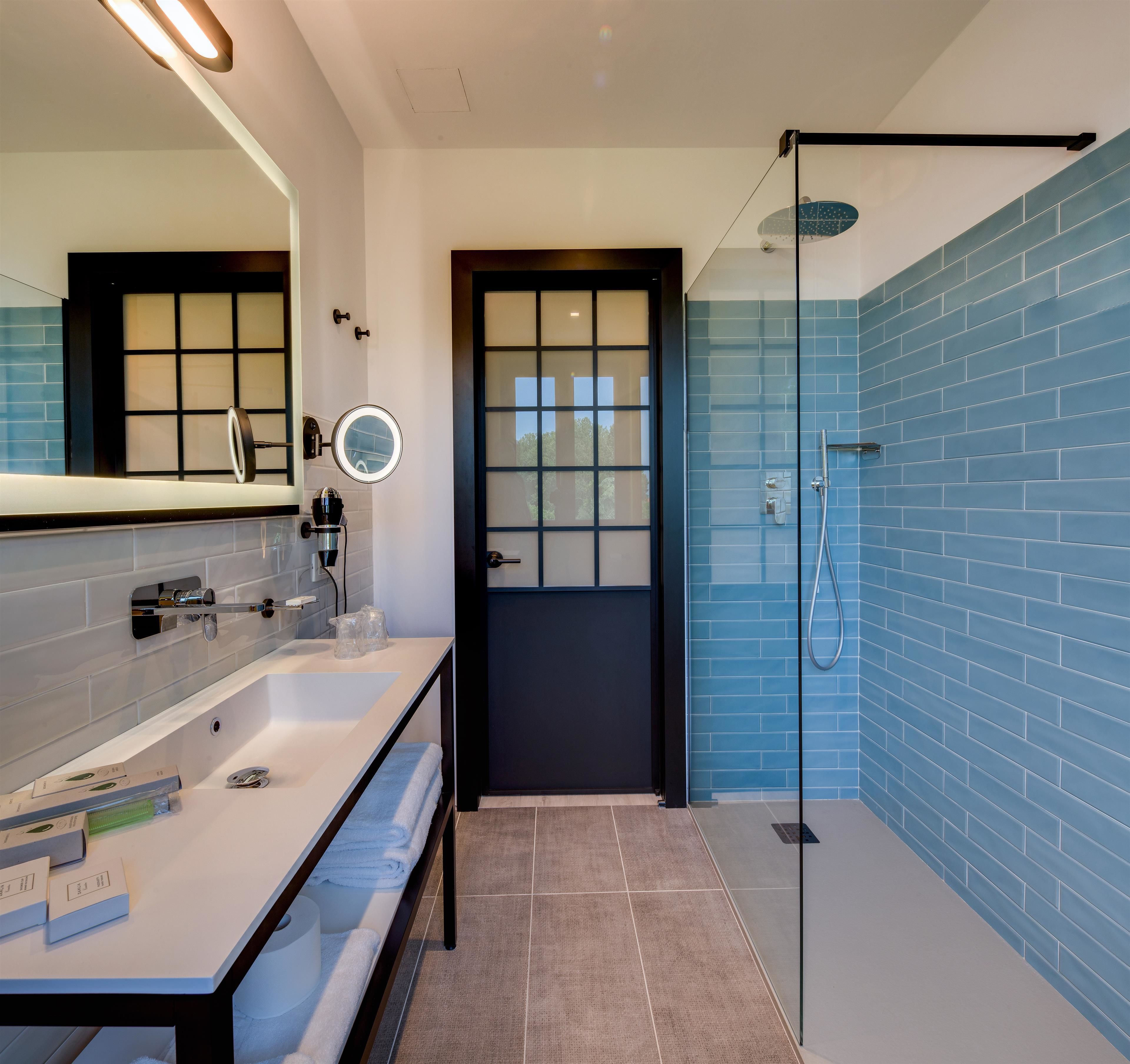 eco-friendly toiletries, hair dryer, bidet, towels