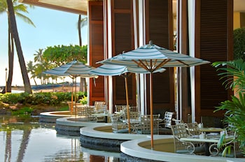 4 outdoor pools, pool umbrellas, sun loungers at Hilton Grand Vacations Club Grand Waikikian Honolulu