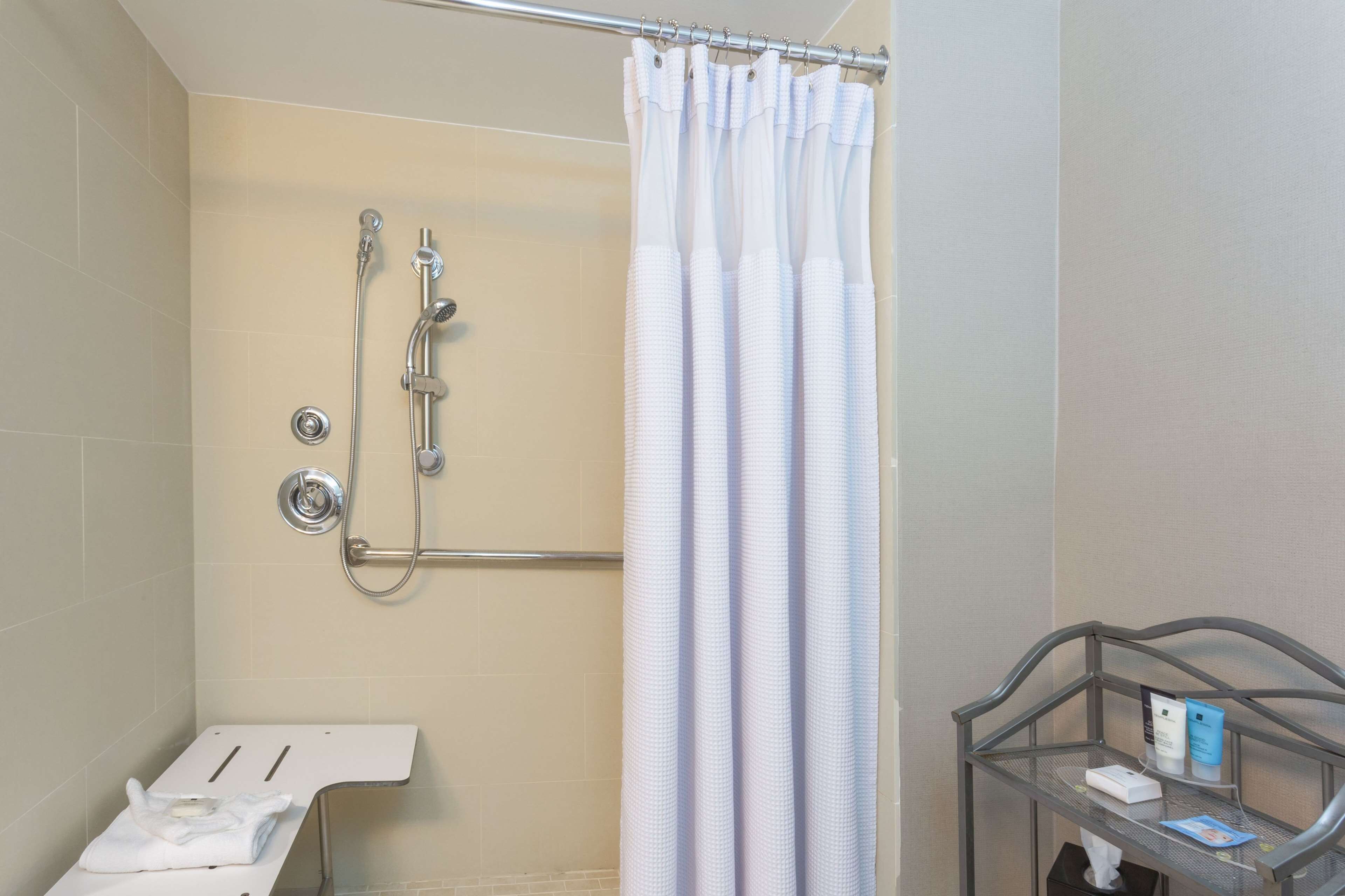 eco-friendly toiletries, hair dryer, towels