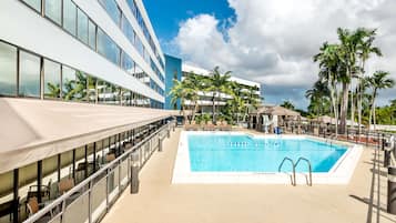 Outdoor pool, free cabanas, pool umbrellas