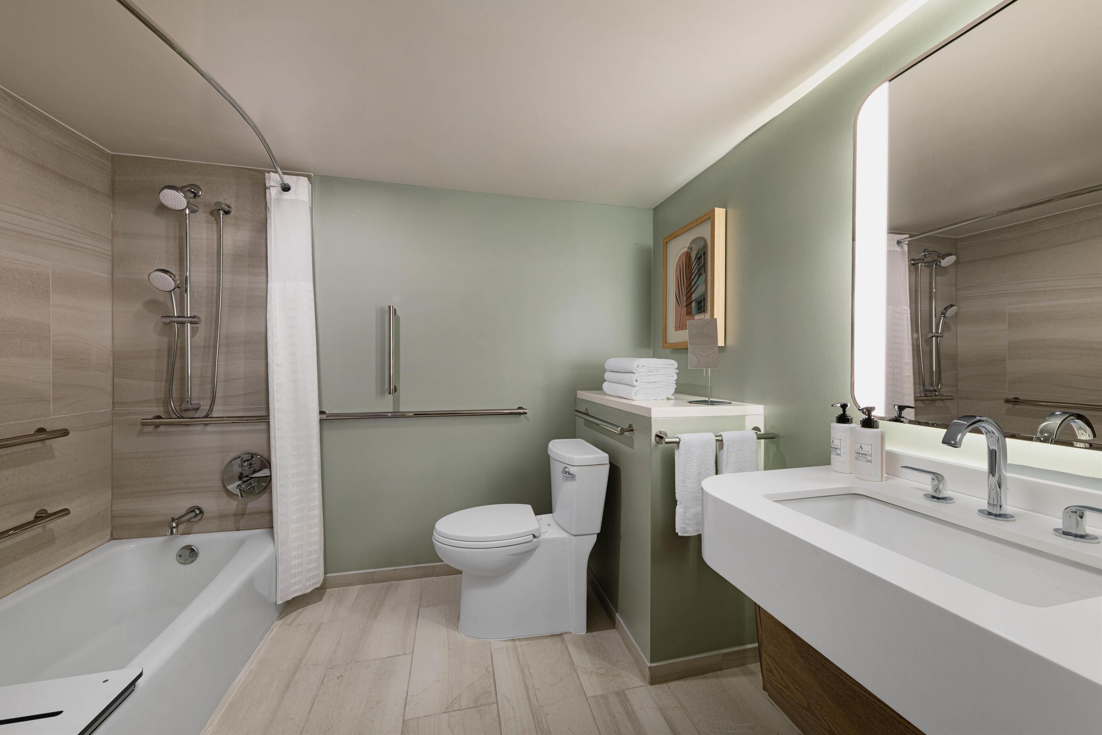 room, 1 king bed, accessible (mobility tub) | in-room safe, desk, laptop workspace, blackout curtains