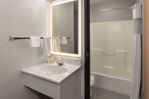 Suite, 1 King Bed, Refrigerator & Microwave | Bathroom | Combined shower/tub, hair dryer, towels