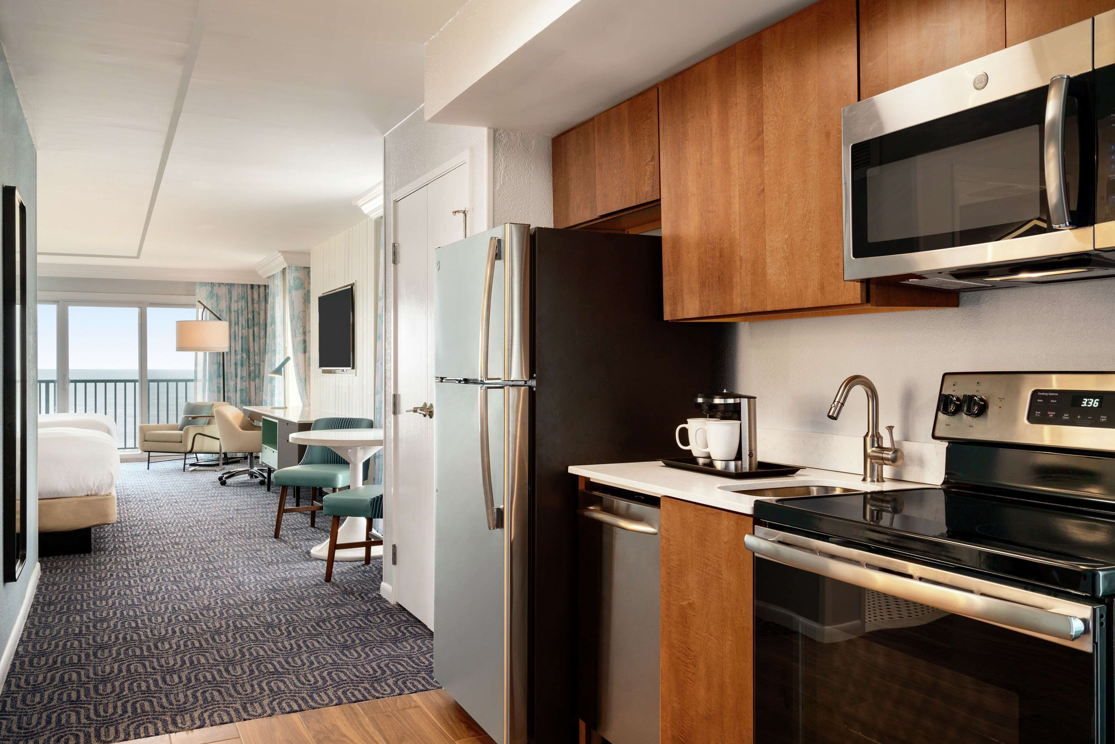 deluxe double room, 2 queen beds, balcony, oceanfront | 1 bedroom, in-room safe, desk, laptop workspace