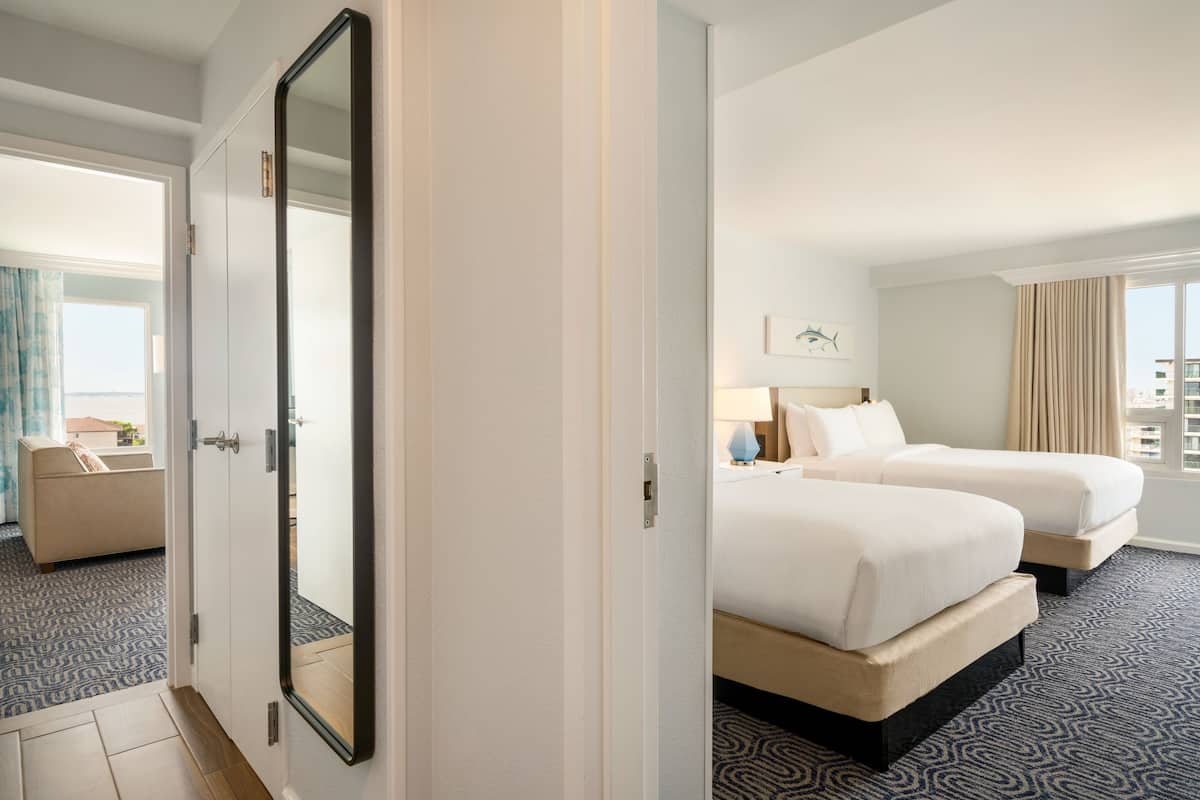 Premium Suite, Balcony, Oceanfront (1 King Bed and 2 Queens) | 1 bedroom, in-room safe, desk, laptop workspace