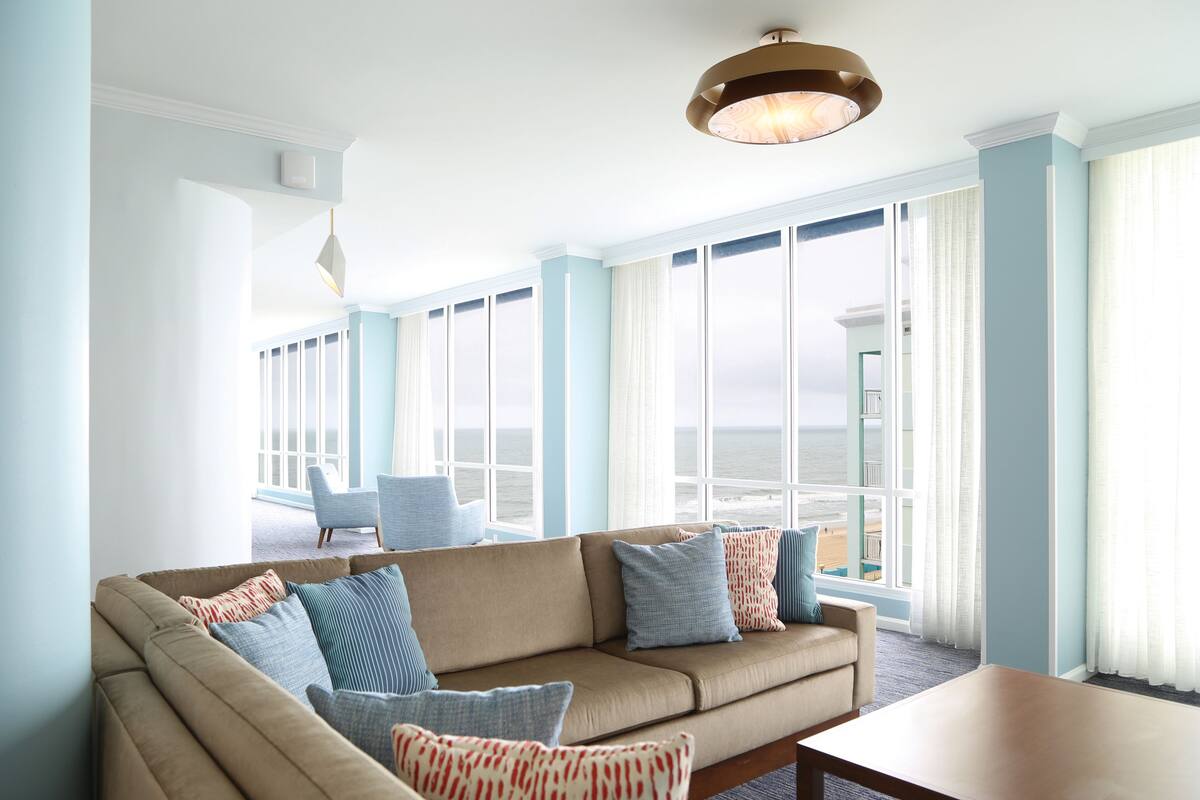 Villa, 4 Bedrooms, Balcony, Oceanfront | Living room | 55-inch flat-screen TV with premium TV channels, TV