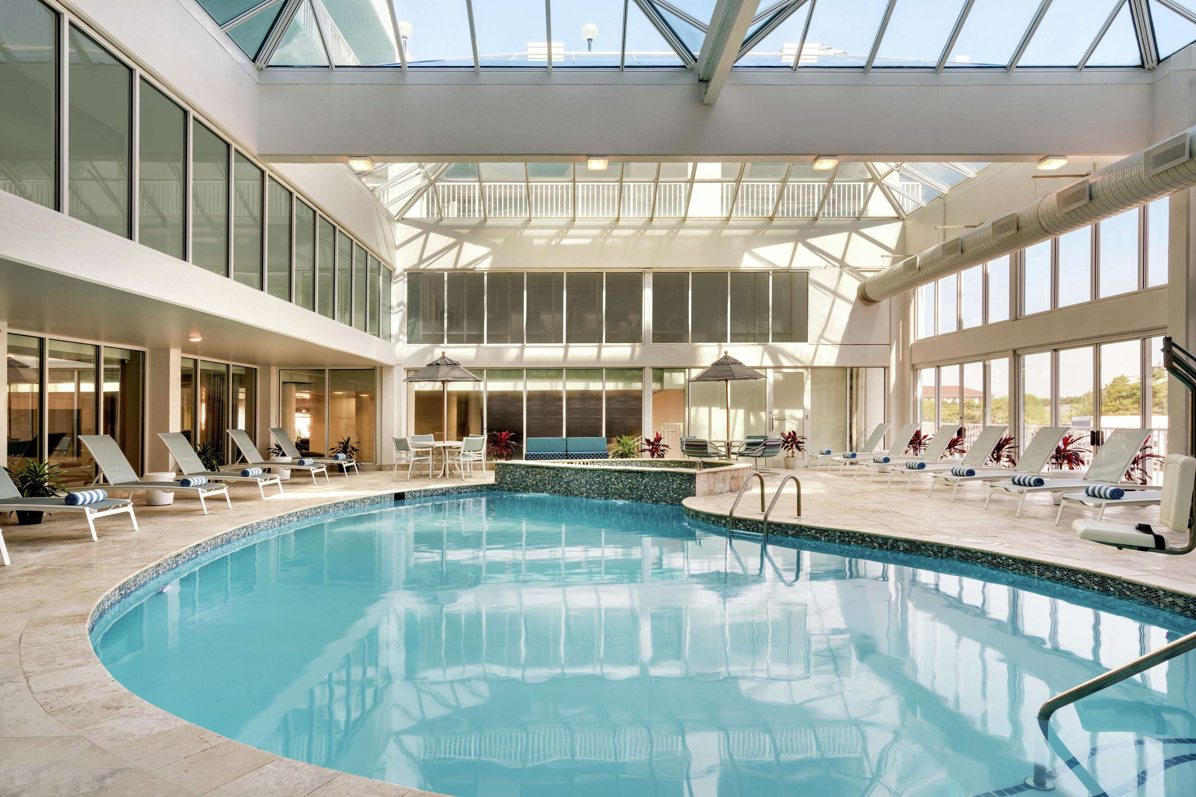 indoor pool, 2 outdoor pools, pool umbrellas, pool loungers