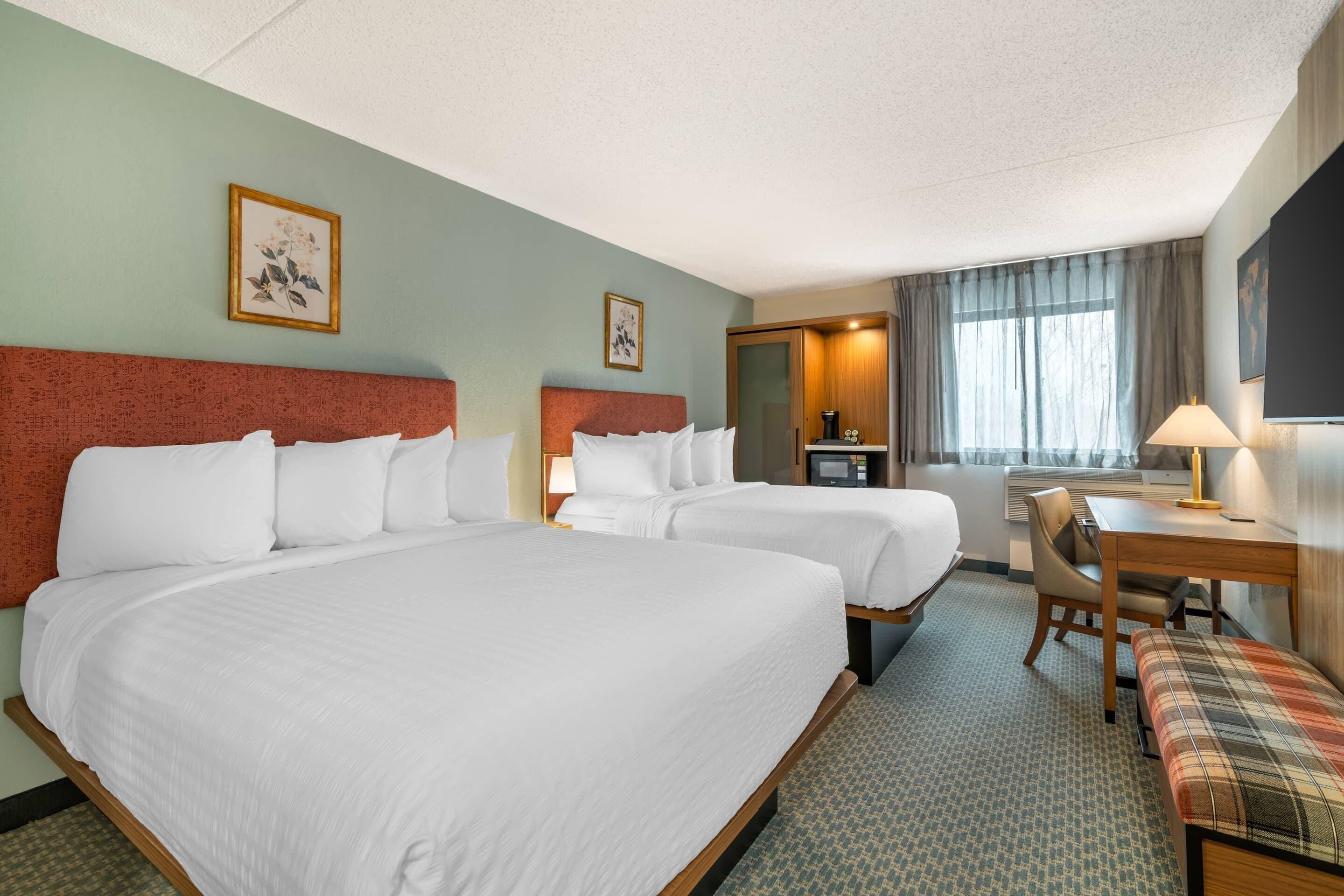 Room, 2 Queen Beds, Non Smoking | Premium bedding, desk, iron/ironing board, free cribs/infant beds