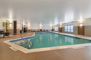 Indoor pool, open 9:00 AM to 11:00 PM, pool loungers
