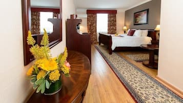 デラックス ルーム キングベッド 1 台 冷蔵庫 シティビュー | 客室ごとに異なるインテリア、遮光カーテン、アイロン / アイロン台、WiFi (無料)