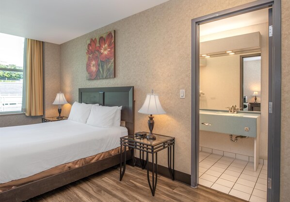 Room, 1 Queen Bed (Coast) | 1 bedroom, hypo-allergenic bedding, individually furnished, desk