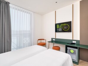 Minibar, coffres-forts dans les chambres, bureau, Wi-Fi gratuit