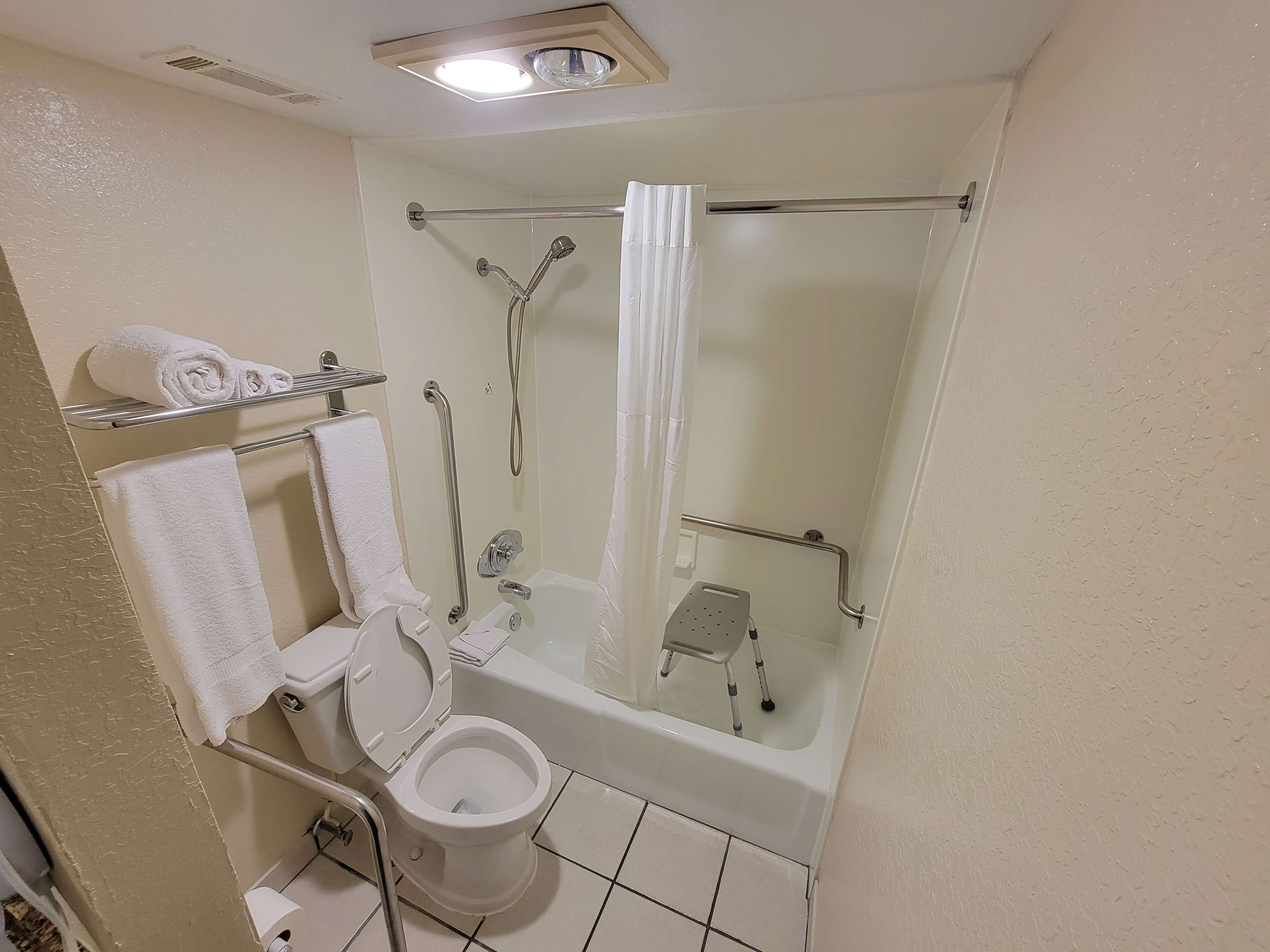 combined shower/bathtub, eco-friendly toiletries, hair dryer, towels