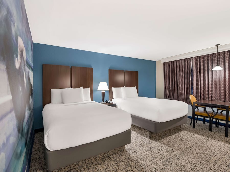 Premium bedding, down duvets, pillow-top beds, in-room safe