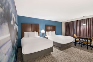Premium bedding, down duvets, pillow-top beds, in-room safe