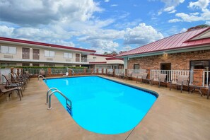Seasonal outdoor pool, pool umbrellas, sun loungers
