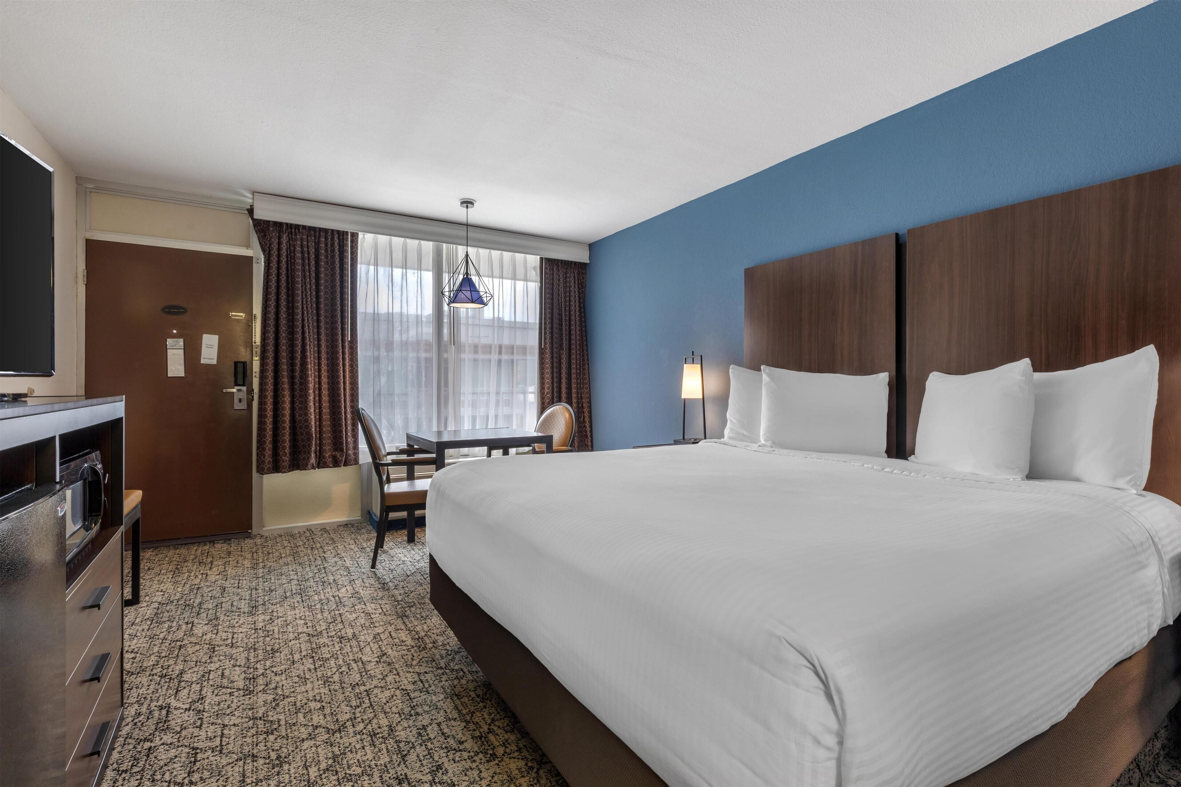 Premium bedding, down comforters, pillowtop beds, in-room safe