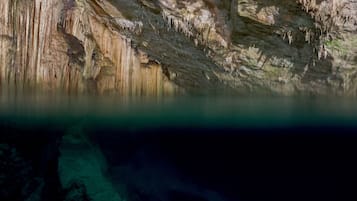 A cave with stalactites and stalagmites.