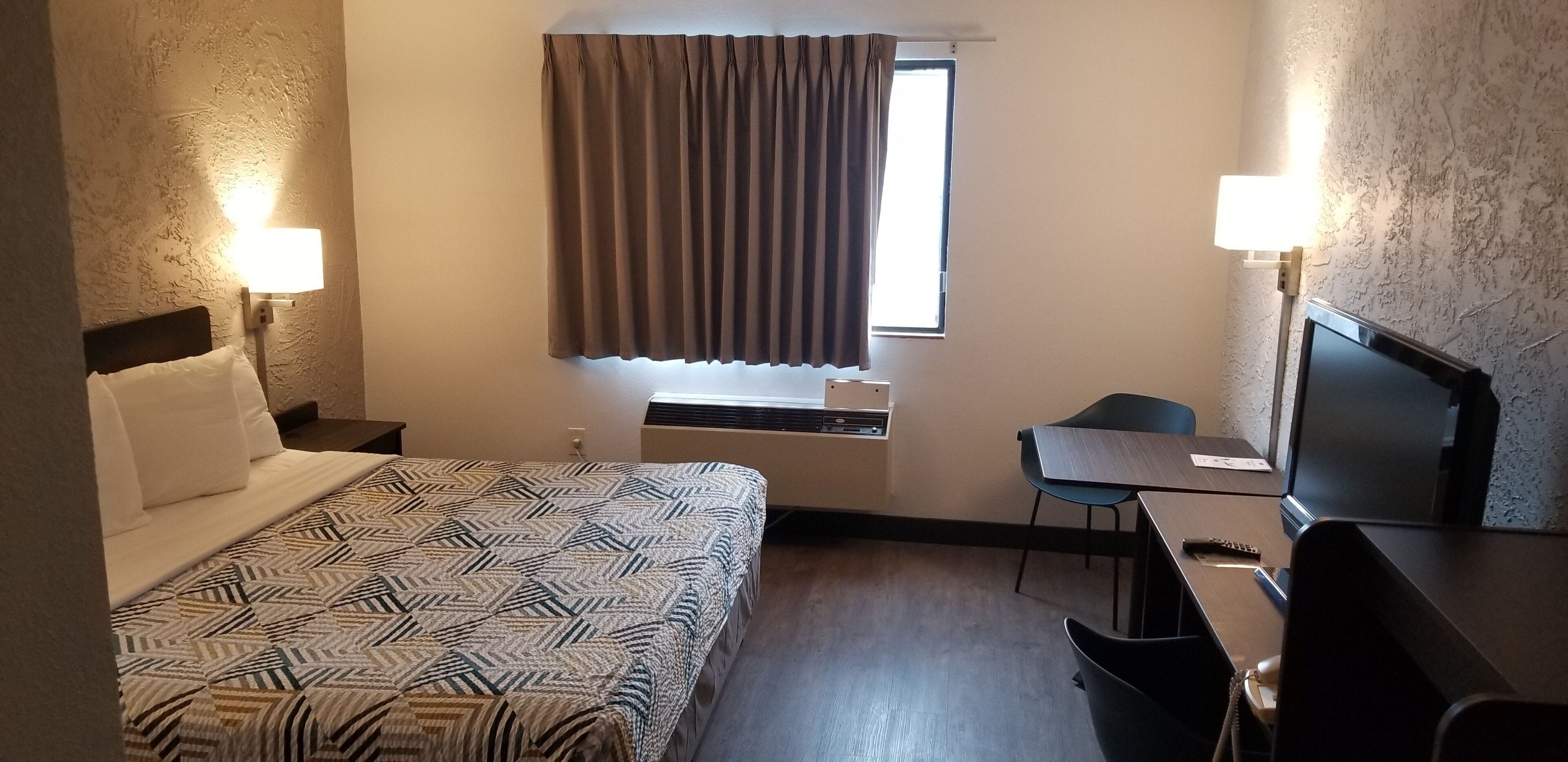 Minibar, desk, laptop workspace, blackout drapes