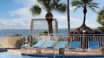 2 outdoor pools, a heated pool, open 6:00 AM to 10:00 PM, pool umbrellas