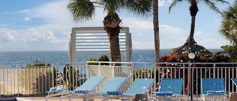 2 outdoor pools, a heated pool, open 6:00 AM to 10:00 PM, pool umbrellas