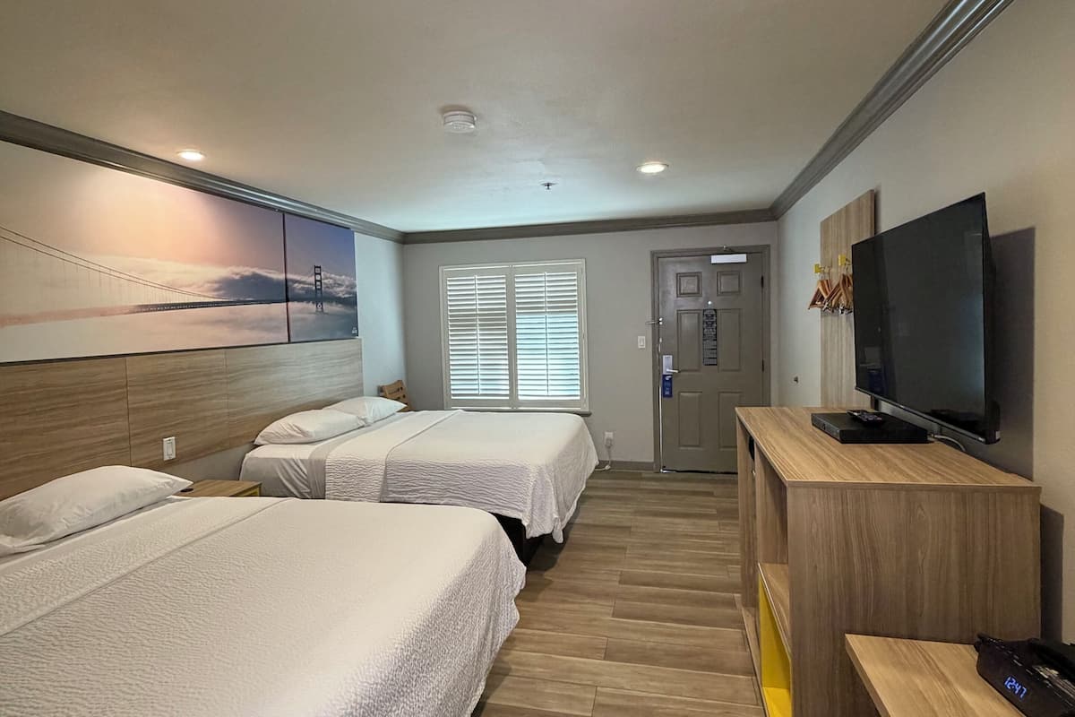 Standard Room, 2 Queen Beds | In-room safe, desk, blackout drapes, iron/ironing board