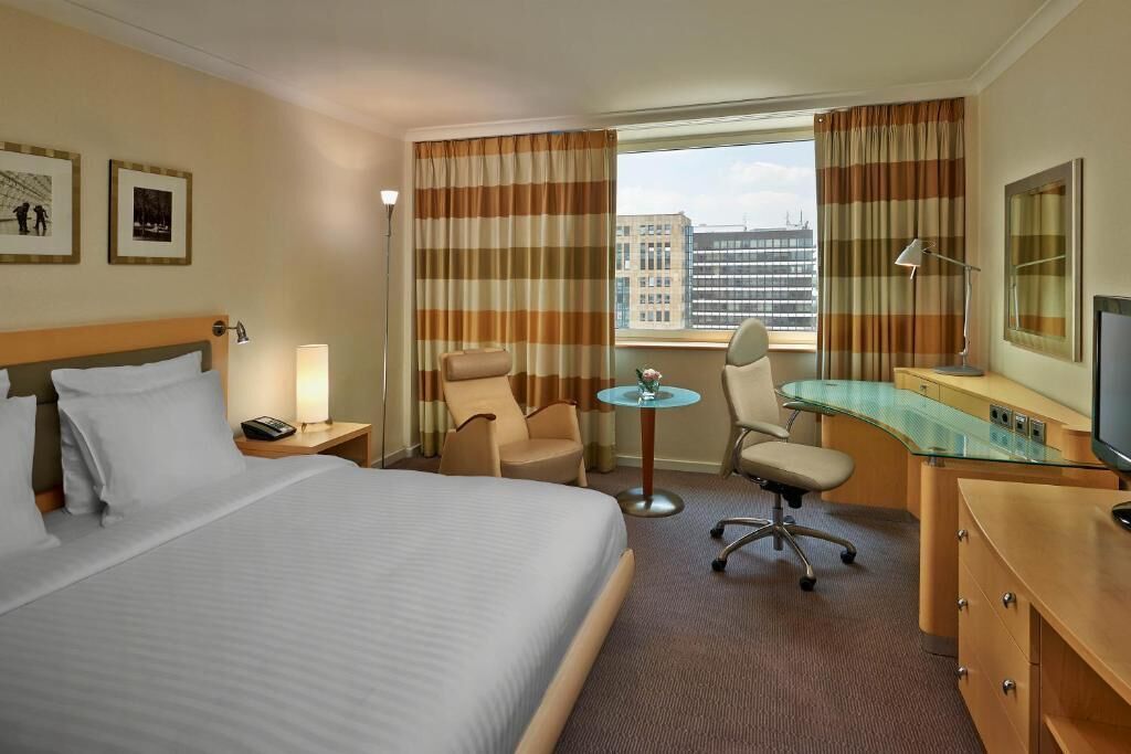 Ropa de cama de alta calidad y minibar 