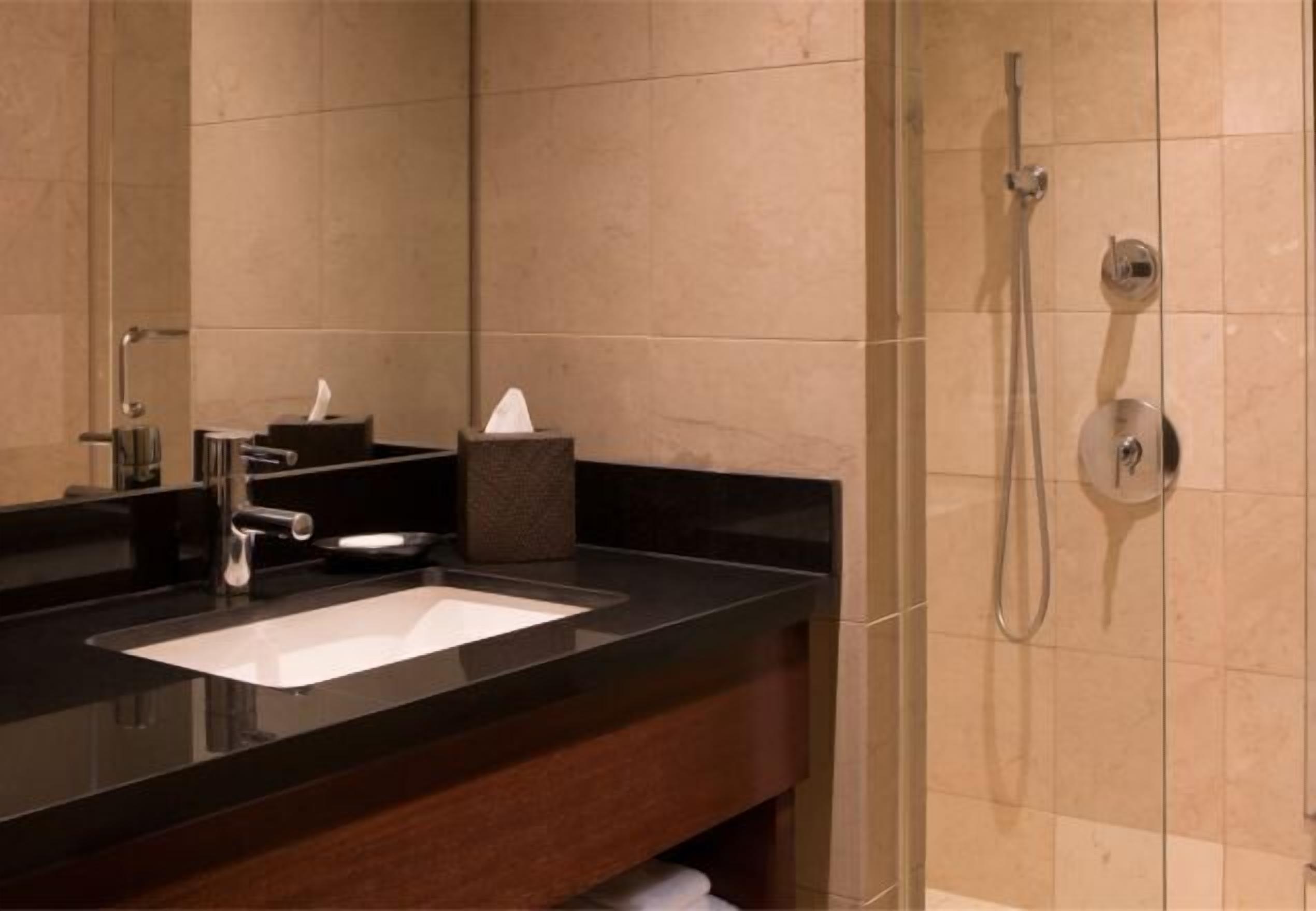 Designer toiletries, hair dryer, bathrobes, towels