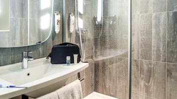 Shower, eco-friendly toiletries, hair dryer, towels