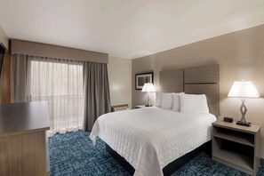 Standard Room, 1 King Bed, Non Smoking, Balcony (Pet Friendly) | Desk, laptop workspace, blackout drapes, iron/ironing board