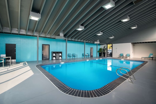 Indoor pool, open 9 AM to midnight, pool loungers