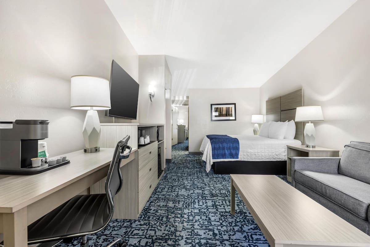 Family Suite, Multiple Beds, Non Smoking, Refrigerator & Microwave (Queen sofabed) | Desk, laptop workspace, blackout drapes, iron/ironing board