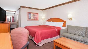 Basic Room, 1 King Bed, Mobility Accessible, Non Smoking | Desk, laptop workspace, blackout drapes, iron/ironing board