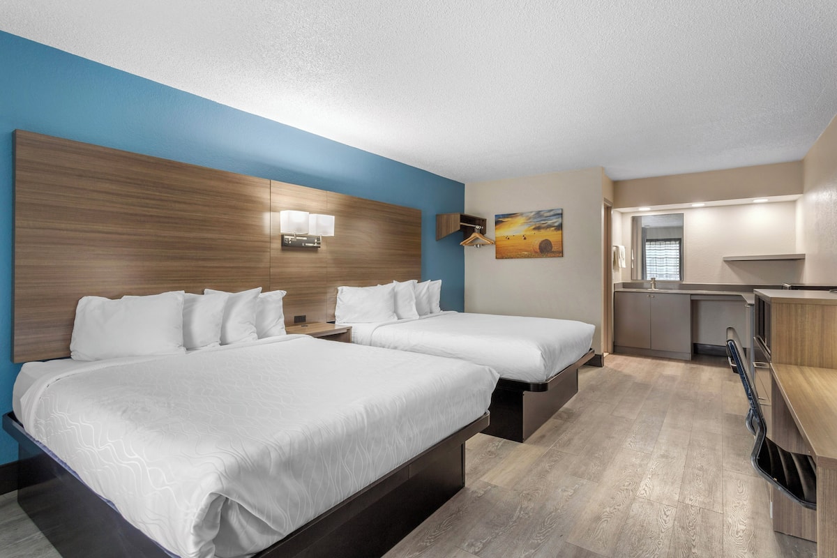 Room, 2 Queen Beds, Non Smoking, Pool View | Desk, laptop workspace, blackout drapes, iron/ironing board