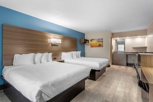 Room, 2 Queen Beds, Non Smoking, Pool View | Desk, laptop workspace, blackout drapes, iron/ironing board