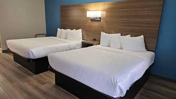 Desk, laptop workspace, blackout drapes, iron/ironing board