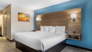 Room, 1 King Bed, Mobility Accessible, Non Smoking (Roll-in Shower) | Desk, laptop workspace, blackout drapes, iron/ironing board