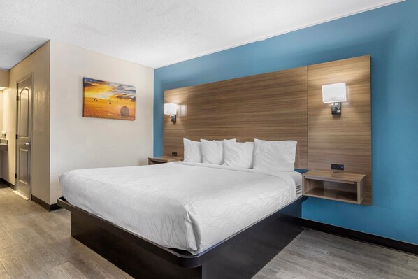 Room, 1 King Bed, Mobility Accessible, Non Smoking (Roll-in Shower) | Desk, laptop workspace, blackout curtains, iron/ironing board