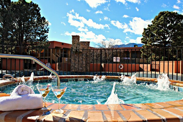 Indoor pool, outdoor pool, open 8:00 AM to 10:00 PM, pool umbrellas