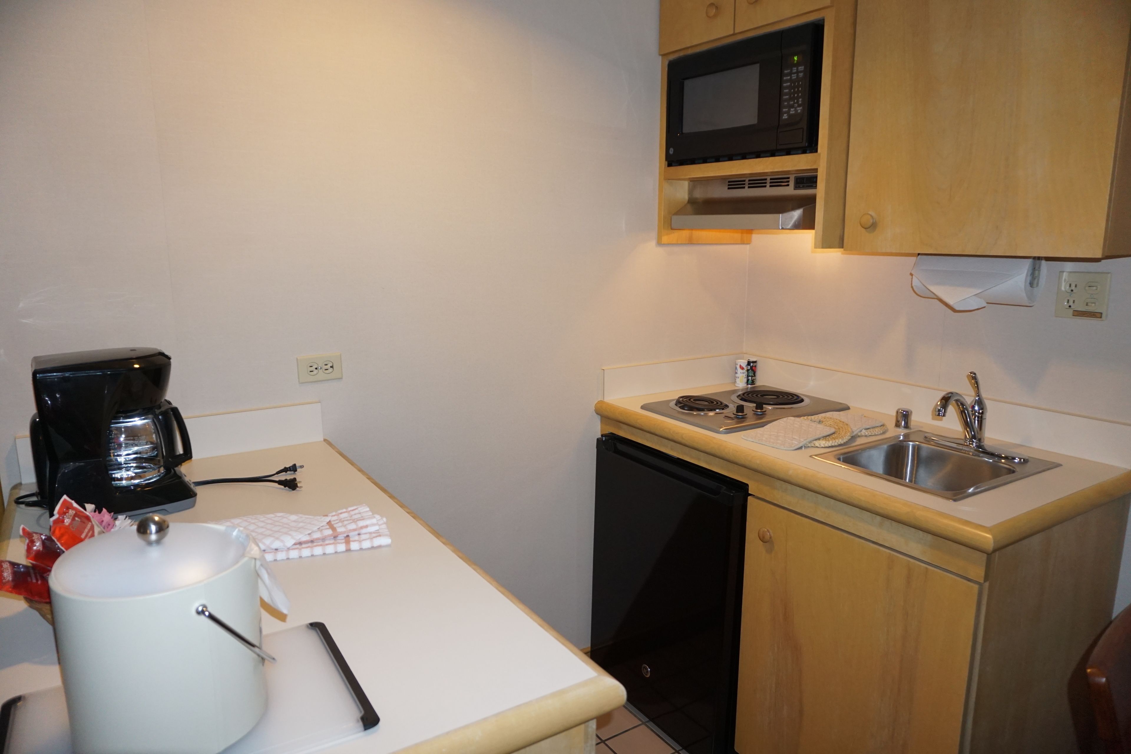 mini-fridge, microwave, stovetop, dishwasher