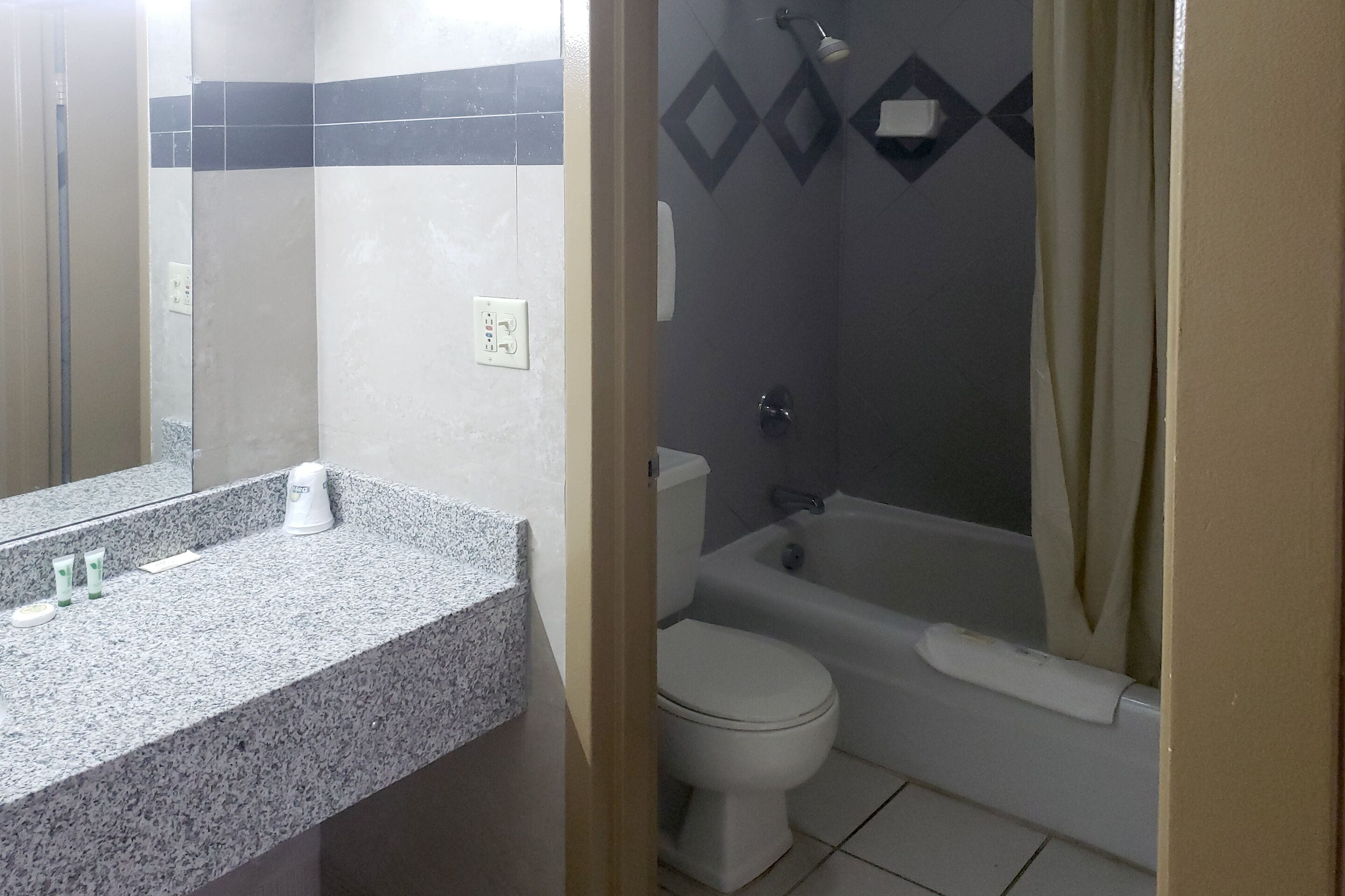 room, 1 king bed | bathroom | free toiletries, hair dryer, towels