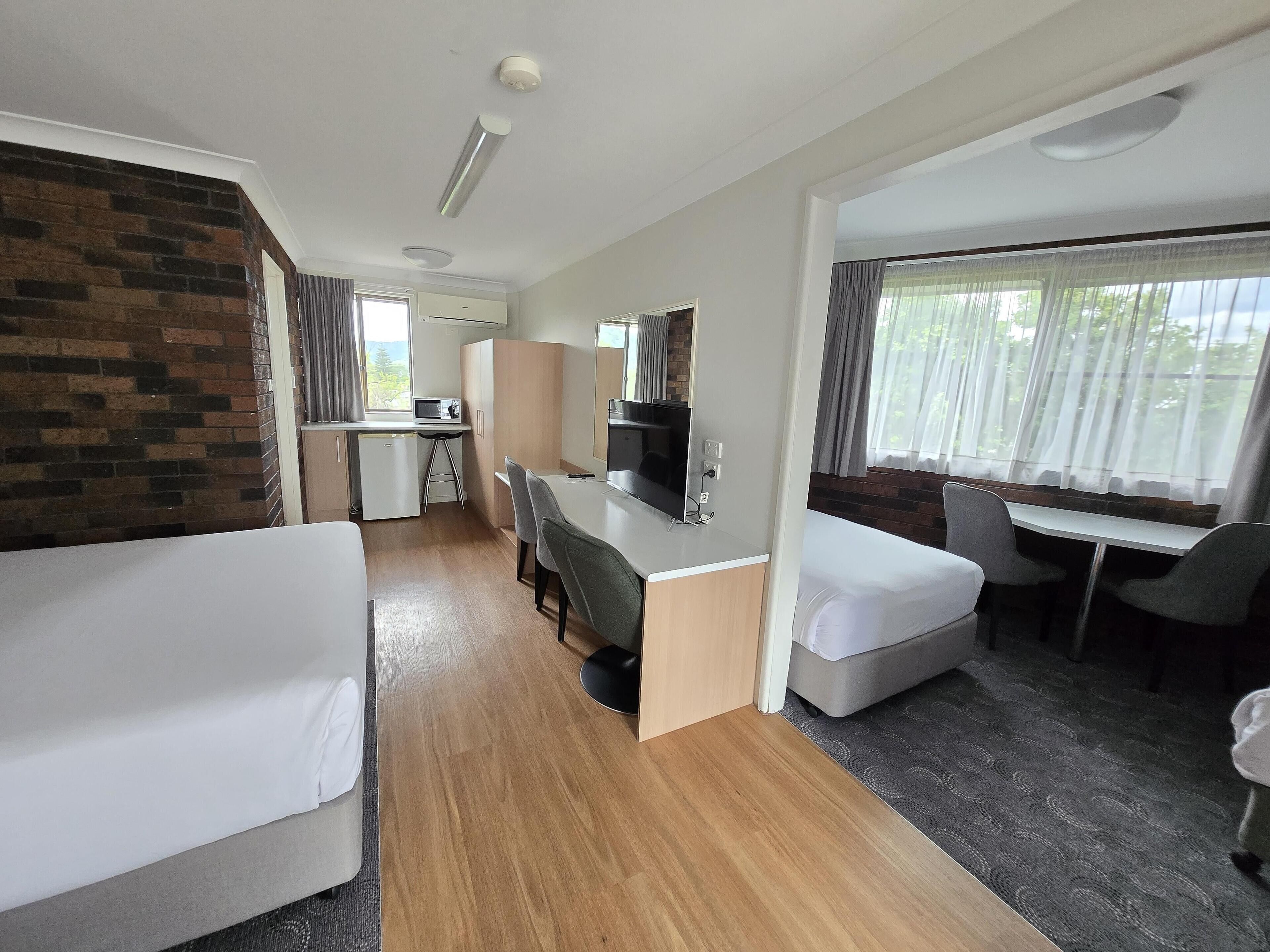 Suite, Multiple Beds, Non Smoking | Pillowtop beds, desk, blackout drapes, iron/ironing board